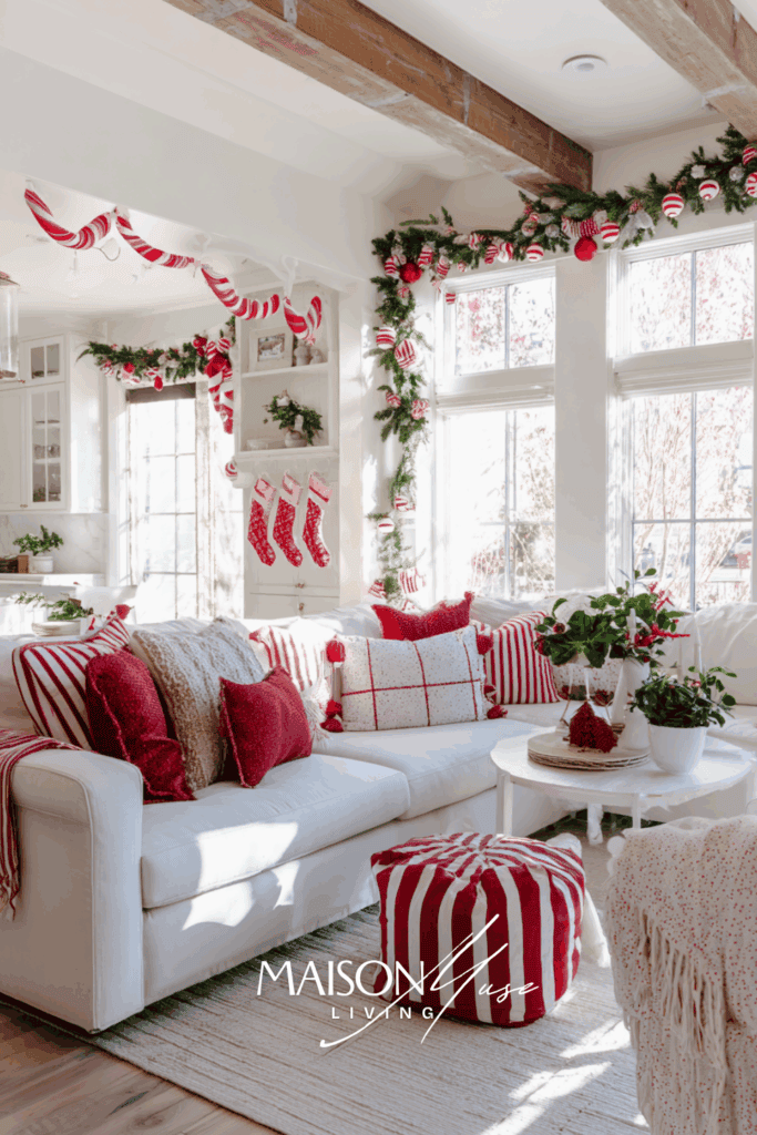 Christmas living room in red and white palette, candy cane garlands, peppermint ornaments, cozy stockings