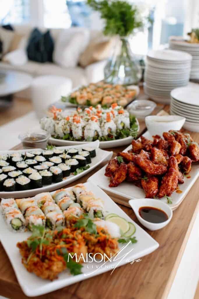 international dinner party table with dishes from multiple cultures