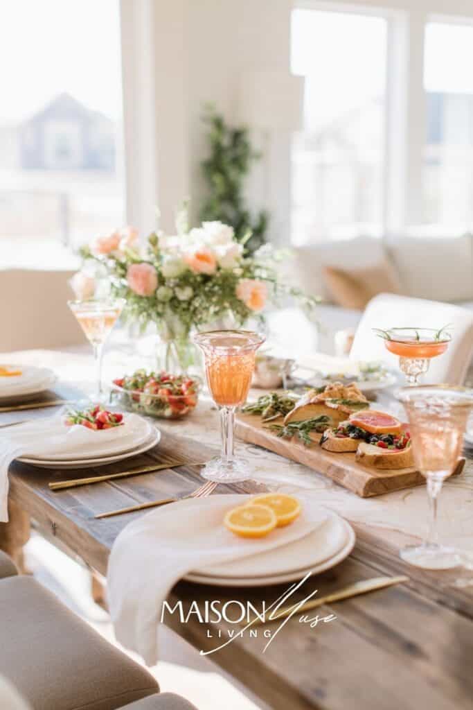 vintage cocktail hour dinner party scene with old fashioned glassware
