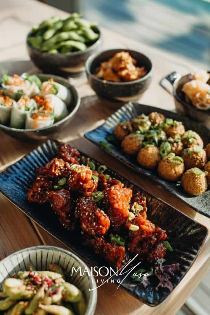 dinner party table with global tapas small plates