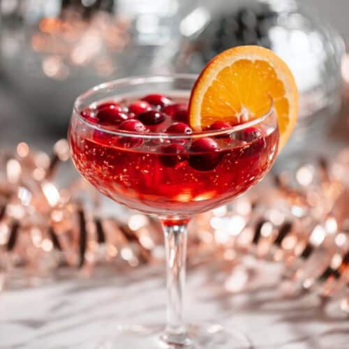 cranberry citrus fizz in coupe glass