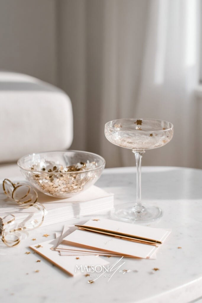 note papers and pen on a desk with glitter