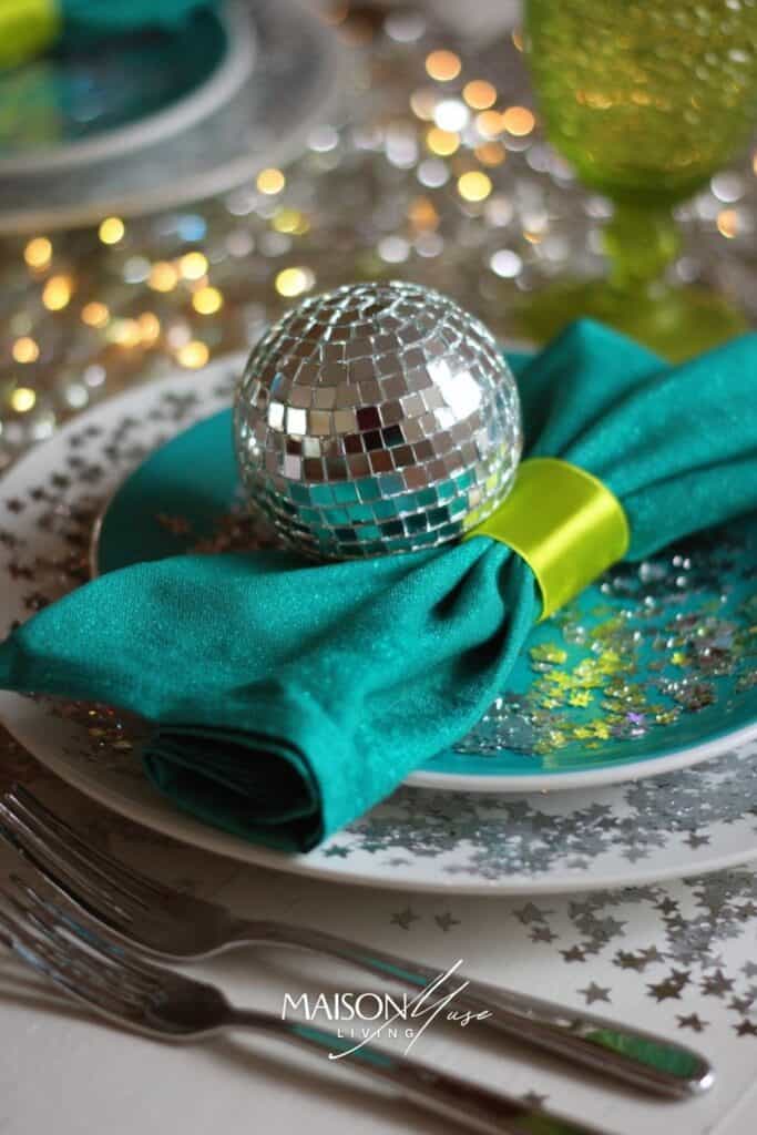 Emerald, teal and a touch of neon citron disco ball new year's eve color palette