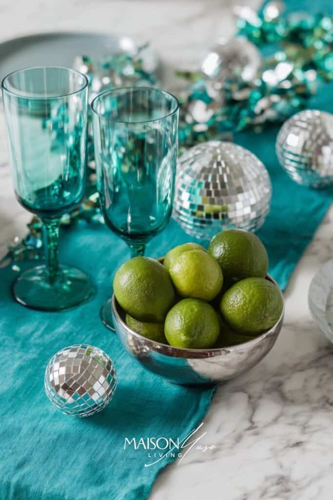Emerald, teal and a touch of neon citron disco ball new year's eve color palette