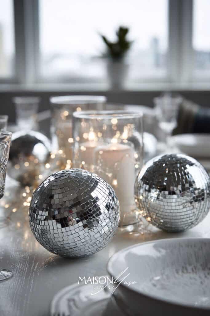 disco balls and candles as table decor